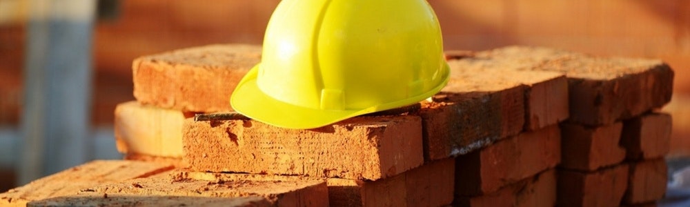 construction hat sitting on bricks - full width.jpg